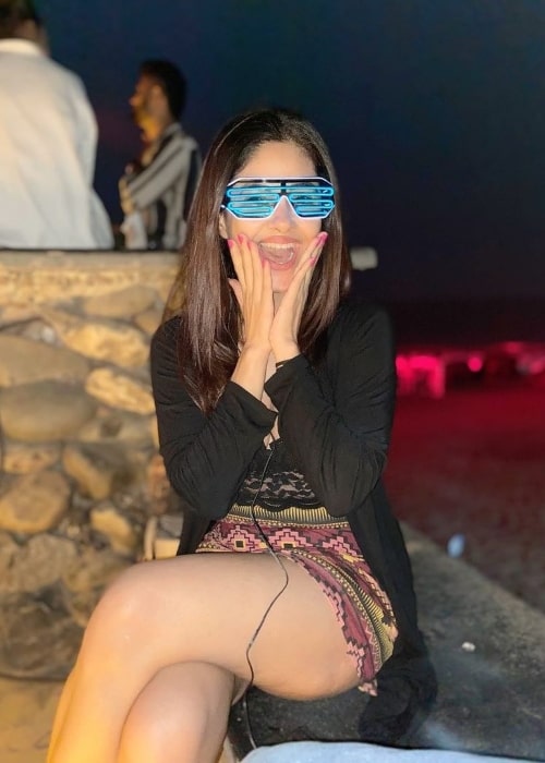 Meera Chopra posing for a picture at Candolim Beach in Goa in January 2021