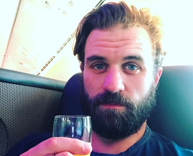 Milo Gibson in February 2017 saying cheers to himself and his beard