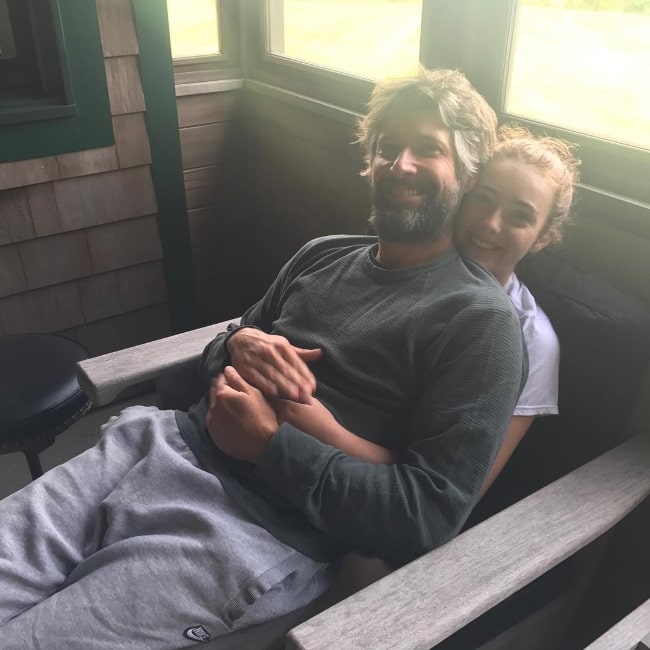 Bart Freundlich and his daughter smiling for a picture