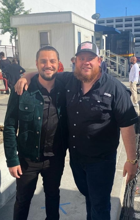 Chayce Beckham (Left) as seen while smiling for a picture alongside Luke Combs in May 2021