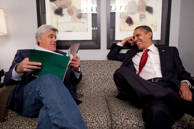 Jay Leno (Left) and Barack Obama talking off the set of 'The Tonight Show' at NBC Studios in Burbank, California on March 19, 2009