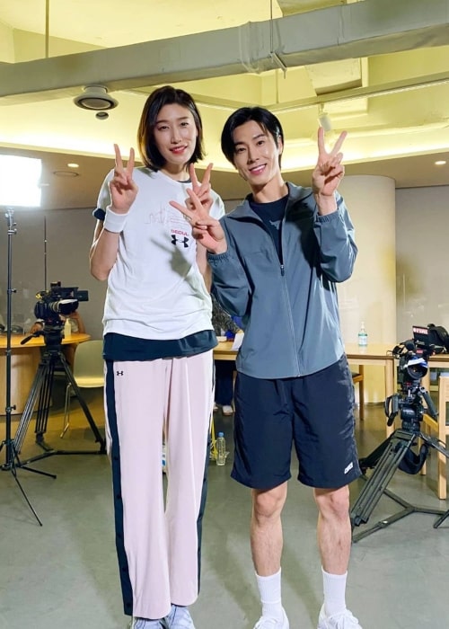 Jung Yun-ho as seen in a picture that was taken with volley ball player Kim Yeon-koung in June 2020