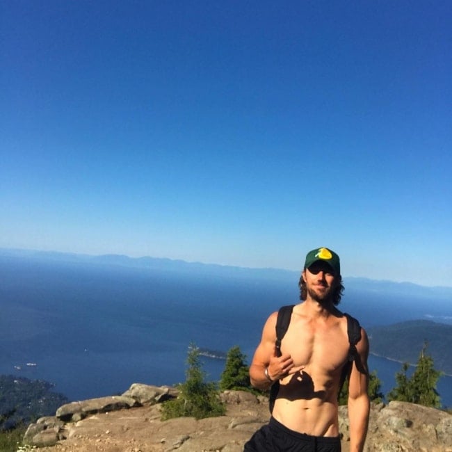 Adam Demos as seen while posing shirtless for a picture in Vancouver, British Columbia in 2020
