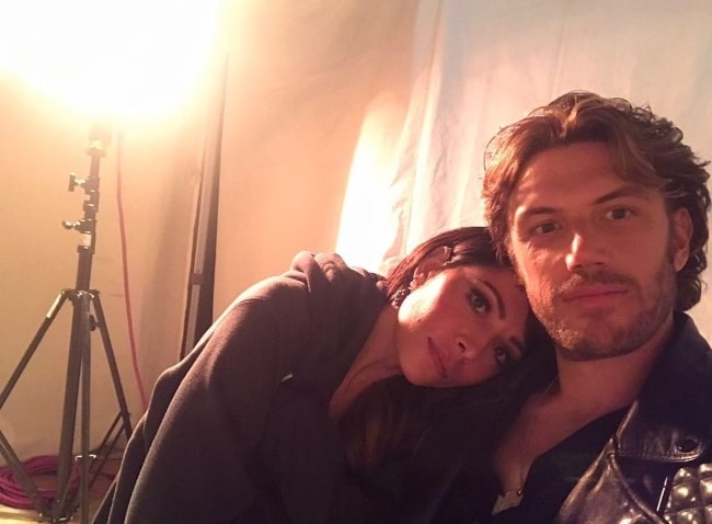 Adam Demos in a selfie with Sarah Shahi in February 2021