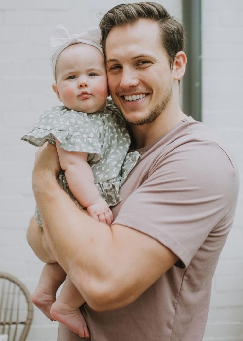 Andrew East with his daughter, as seen in June 2020