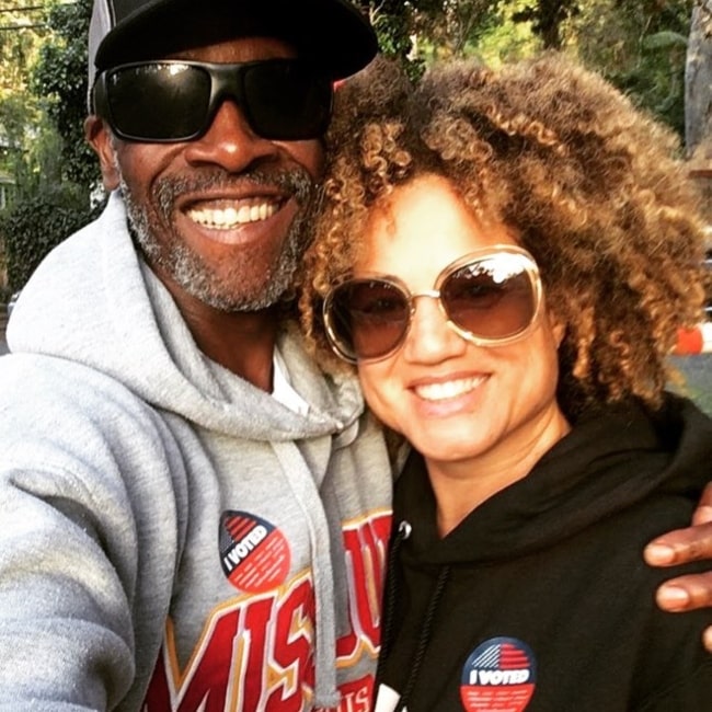 Bridgid Coulter with Don Cheadle after having voted in June 2018