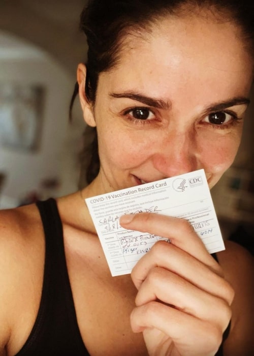 Carla Ossa as seen in a selfie that was taken with her vaccination ceritificate in May 2021