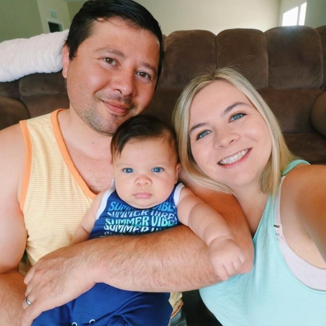 Cassie Hollister alonsg with her husband Carlos Liera and their child Jax in a selfie that was taken in June 2021
