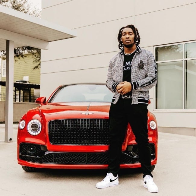 DeMarcus Lawrence as seen in a picture that was taken in front of a Bentley in June 2021
