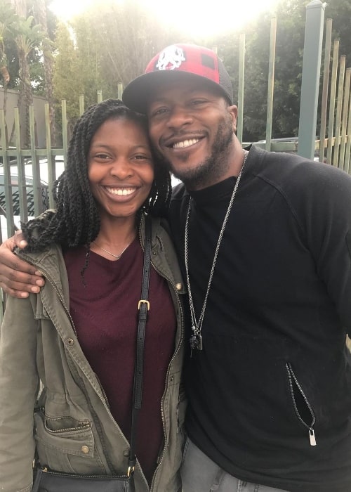 Edwin Hodge smiling for a picture with his sister Briana Hodge