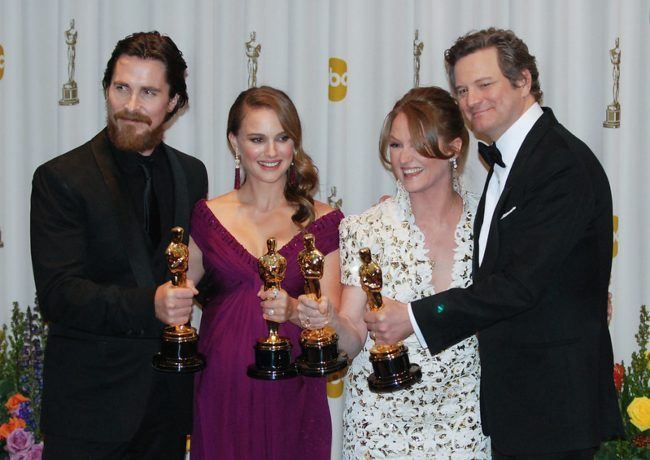 (From l to r) Christian Bale, Natalie Portman, Melissa Leo, and Colin Firth posing with their Oscars in 2011