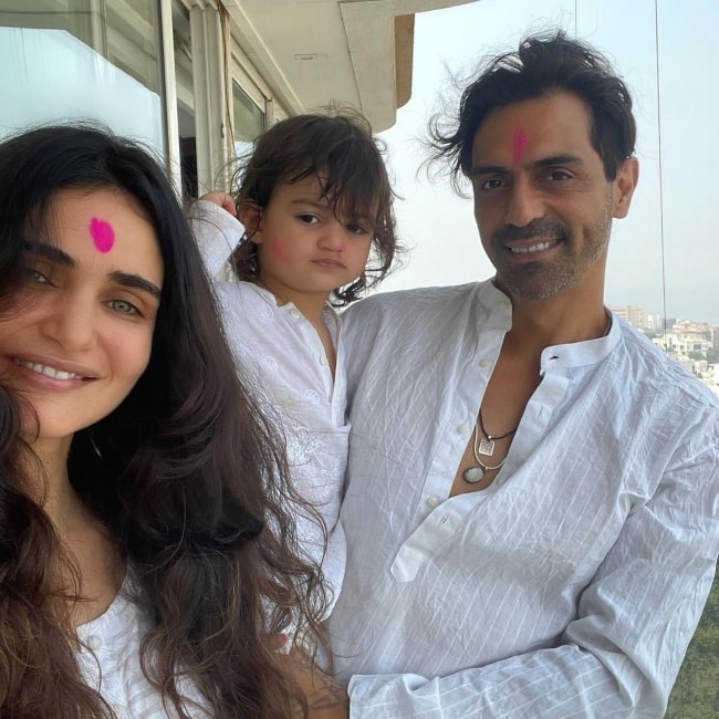 Gabriella Demetriades and her beau Arjun Rampal and son Arik Rampal in March 2021