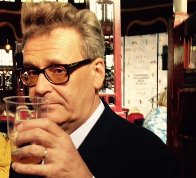 Greg Proops in April 2020 stating he is not watching