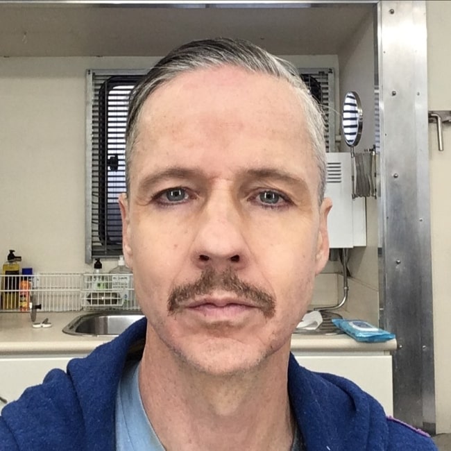 John Cameron Mitchell clicking a selfie in Brisbane, Queensland, Australia in June 2021