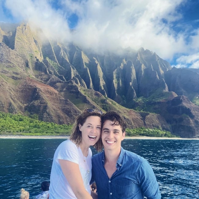Kyle Selig and Erika Henningsen smiling for a picture while enjoying their time in Kauai, Hawai