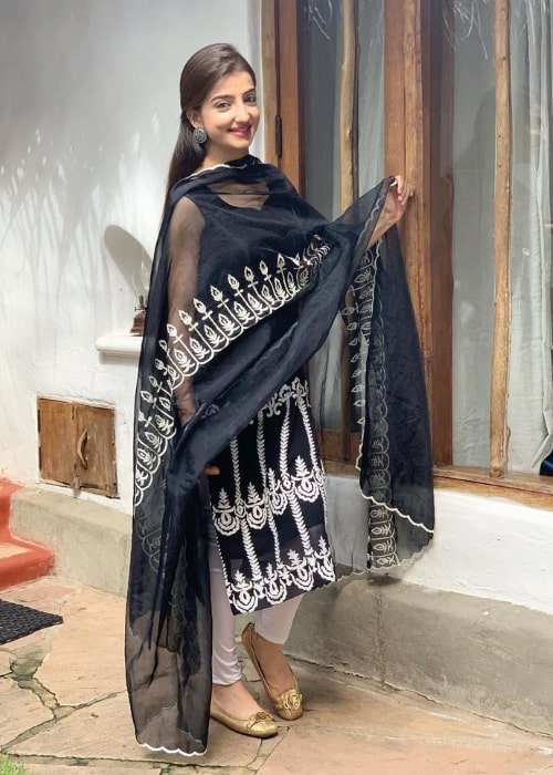 Loveleen Kaur Sasan as seen while smiling for the camera in December 2020