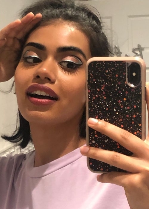 Megan Suri taking a mirror selfie in April 2021