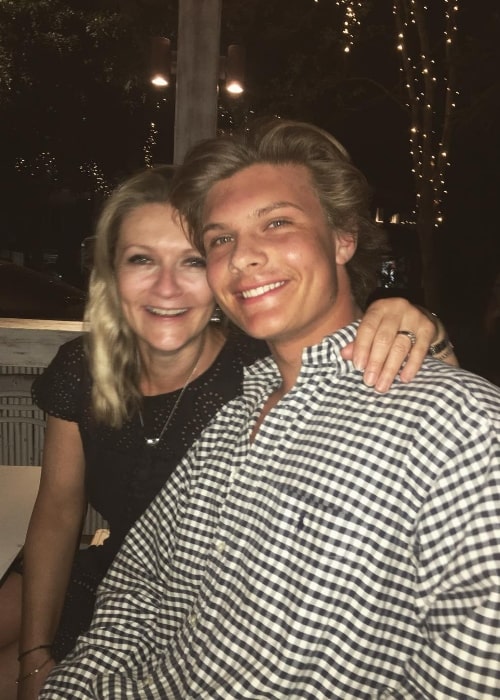 Sam Rechner as seen while smiling in a picture alongside his mother