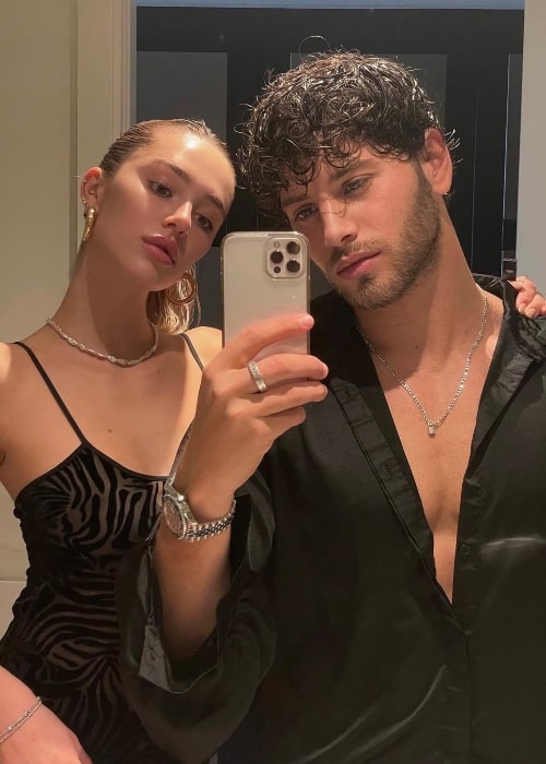 Eyal Booker clicking a mirror selfie with Delilah Belle