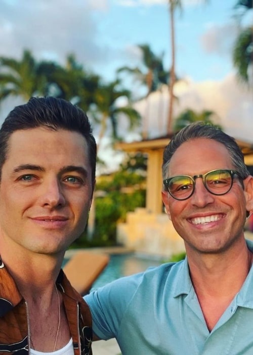 Greg Berlanti and Robbie Rogers, as seen in August 2021