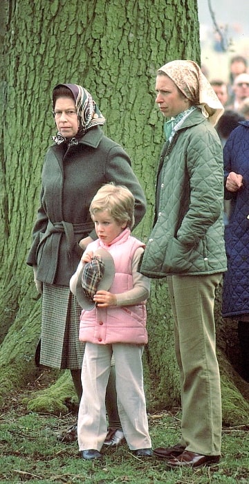 Peter Phillips with his mother Princess Anne (Right) and grandmother Queen Elizabeth II at the Badminton Horse Trials in 1983