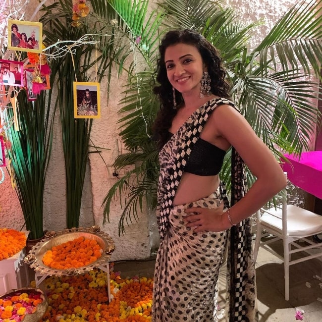 Suhasi Dhami smiling for the camera in March 2020