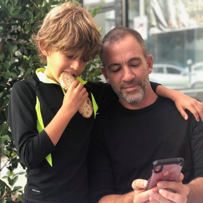 Bryan Callen in a picture with his son