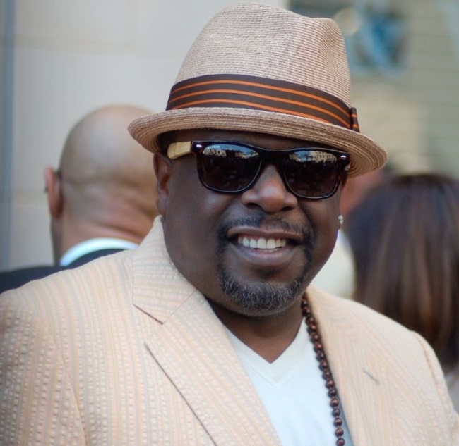 Cedric the Entertainer pictured at a ceremony for Steve Harvey receive a star on the Hollywood Walk of Fame in May 2013