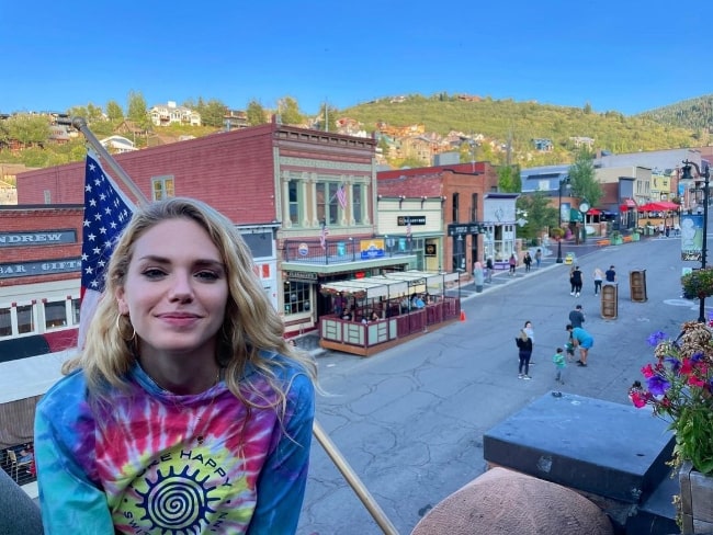 MacKenzie Mauzy as seen while smiling for a picture in Park City, Utah in August 2021