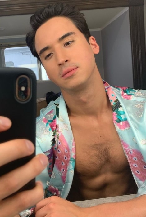 Michael Hsu Rosen in December 2020 wishing everybody happy holidays from him as well as the festive robe he is wearing