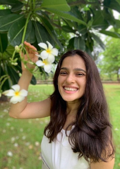 Priya Bapat smiling for a picture in June 2021