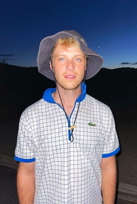 Tyler Barnhardt posing for the camera at Joshua Tree National Park in California in July 2021