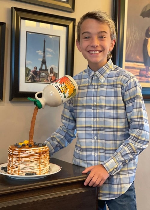 Wolfgang Schaeffer smiling in a picture with his birthday cake in Los Angeles, California in 2021