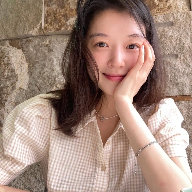 Jo Woo-ri smiling for a picture in August 2021