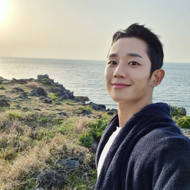 Jung Hae-in smiling for a picture in June 2021