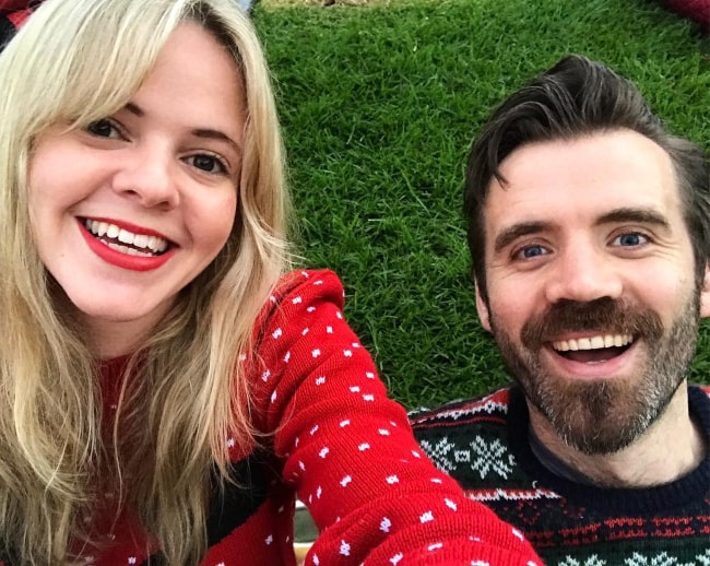 Tegan Higginbotham and her husband in December 2018 with soggy behinds but hearts full of Christmas joy