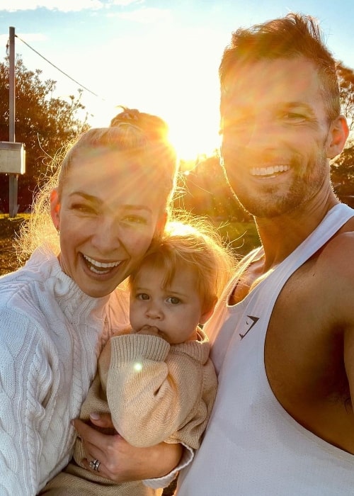 Tim Robards smiling in a picture with his family in Sydney, Australia in 2021