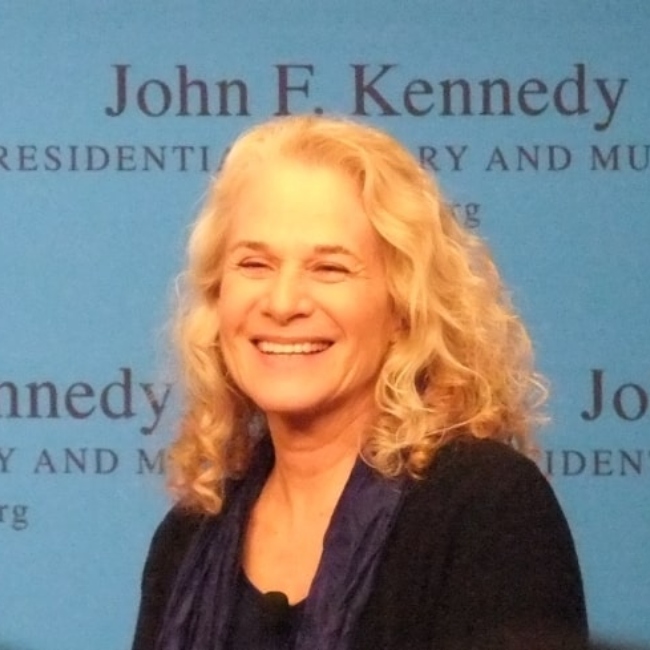 Carole King in an interview by correspondent Mike Barnicle about her new bookA Natural Woman. This was at the JFK Presidential Library-Boston, Mass. on April 12, 2012