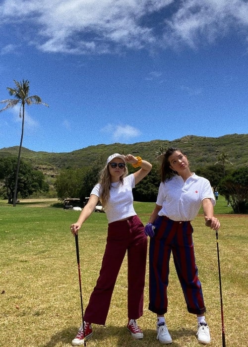 Emma Meisel (Left) posing for a picture alongside Peyton Elizabeth Lee at Hawaii Kai Golf Course in 2021