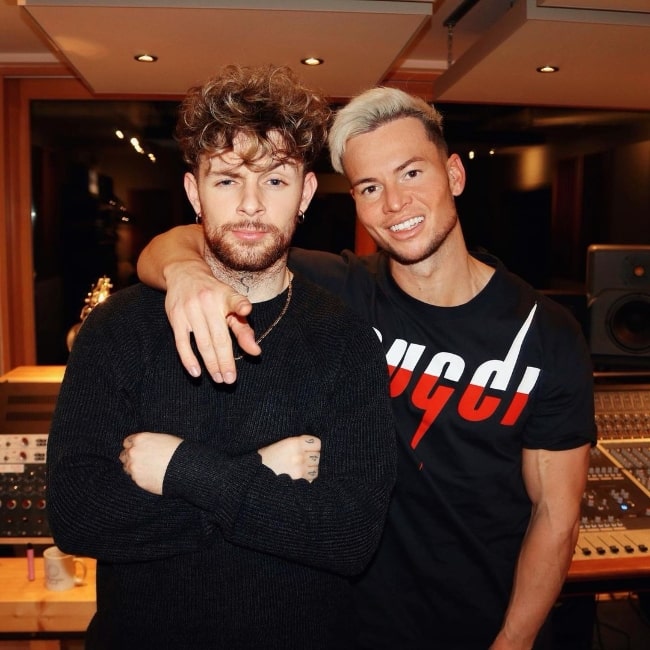 Joel Corry (Right) as seen while posing for a picture alongside Tom Grennan in November 2021