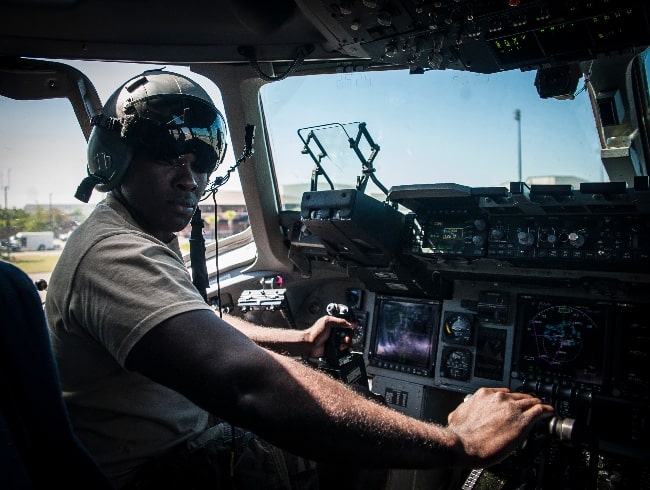 Joshua Henry in the cockpit of a C-17 Globemaster III for 'Army Wives' in 2013