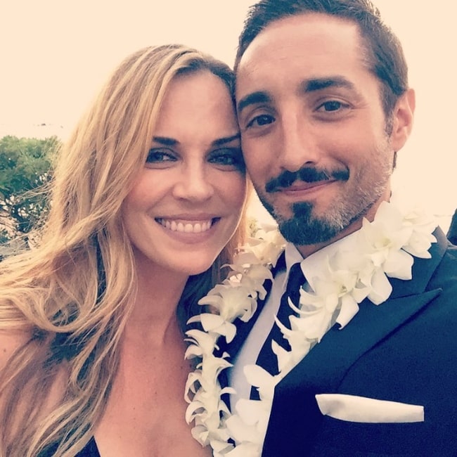 Kelly Sullivan as seen while smiling for a picture alongside Eric Michael Roy at Andaz Maui at Wailea Resort in November 2017