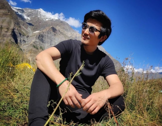 Meiyang Chang posing for the camera in Tandi, Himachal Pradesh, India in September 2021