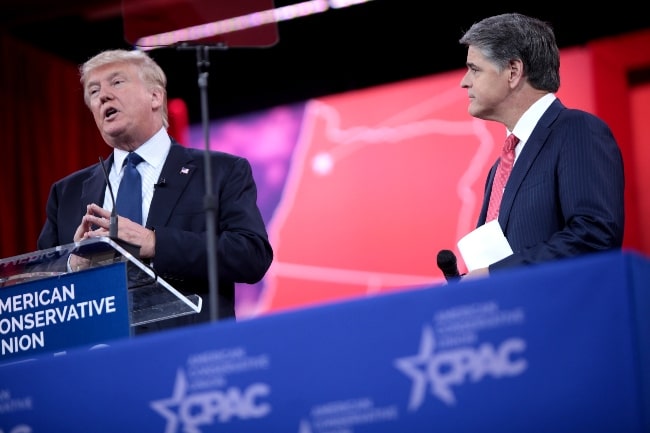 Sean Hannity (Right) and Donald Trump speaking at the 2015 Conservative Political Action Conference (CPAC) in National Harbor, Maryland