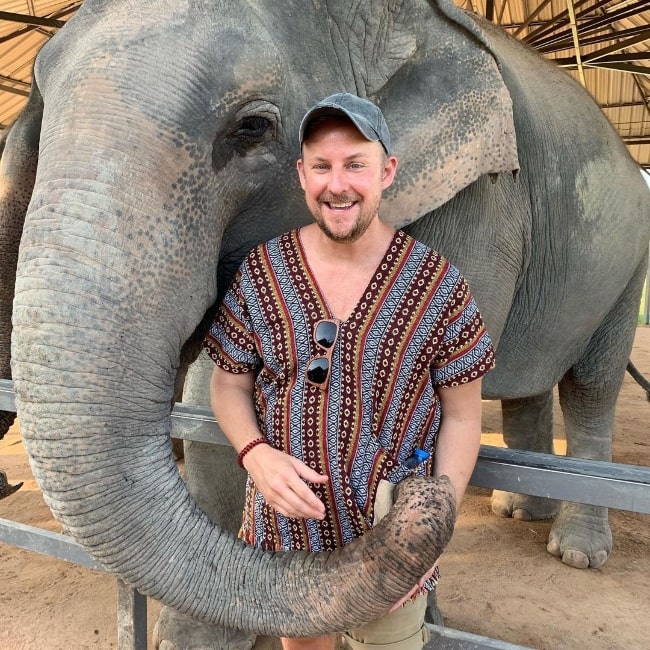 Stephen Guarino as seen while smiling for a picture in 2019