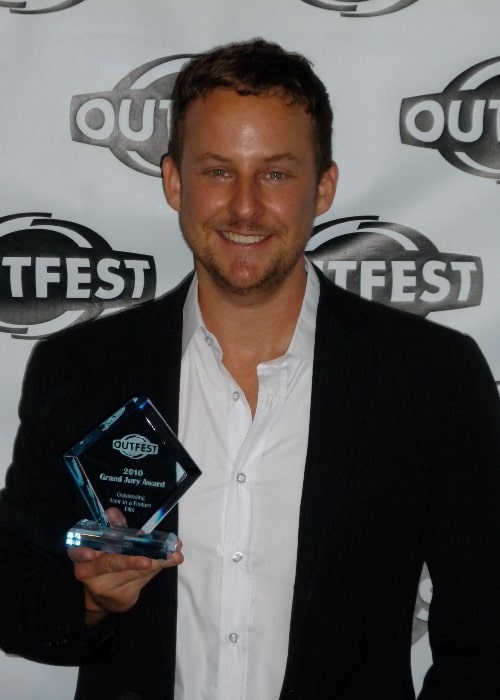Stephen Guarino with the 2010 Outfest Award