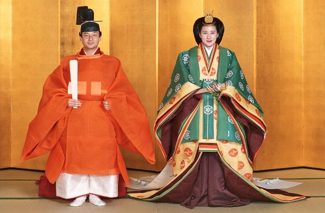 The newly married Crown Prince Naruhito and Crown Princess Masako in Japanese traditional attire, with the Prince wearing a sokutai and the Princess wearing a jūnihitoe in 1993