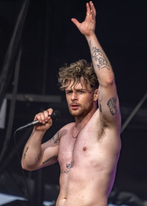 Tom Grennan as seen while performing shirtless at Reading Festival in 2021