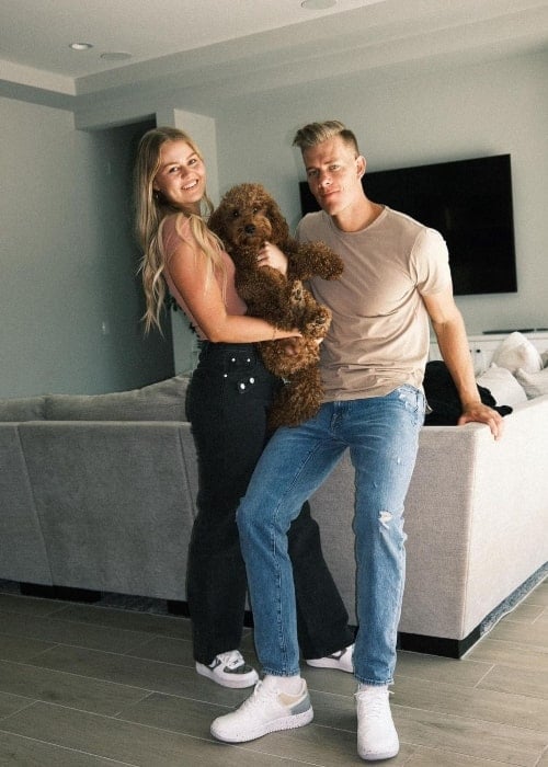 Bella Weems-Lambert and her husband Dallin Lambert and their dog Banks Lambert in November 2021, in Gilbert, Arizona