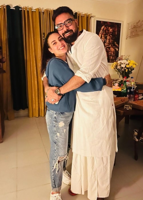 Iqra Aziz as seen in a picture that was taken with her husband Yasir Hussain in December 2021